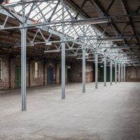 An empty warehouse representing how to pick the right warehouse layout
