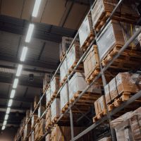 Stacks of shelves inside a warehouse.